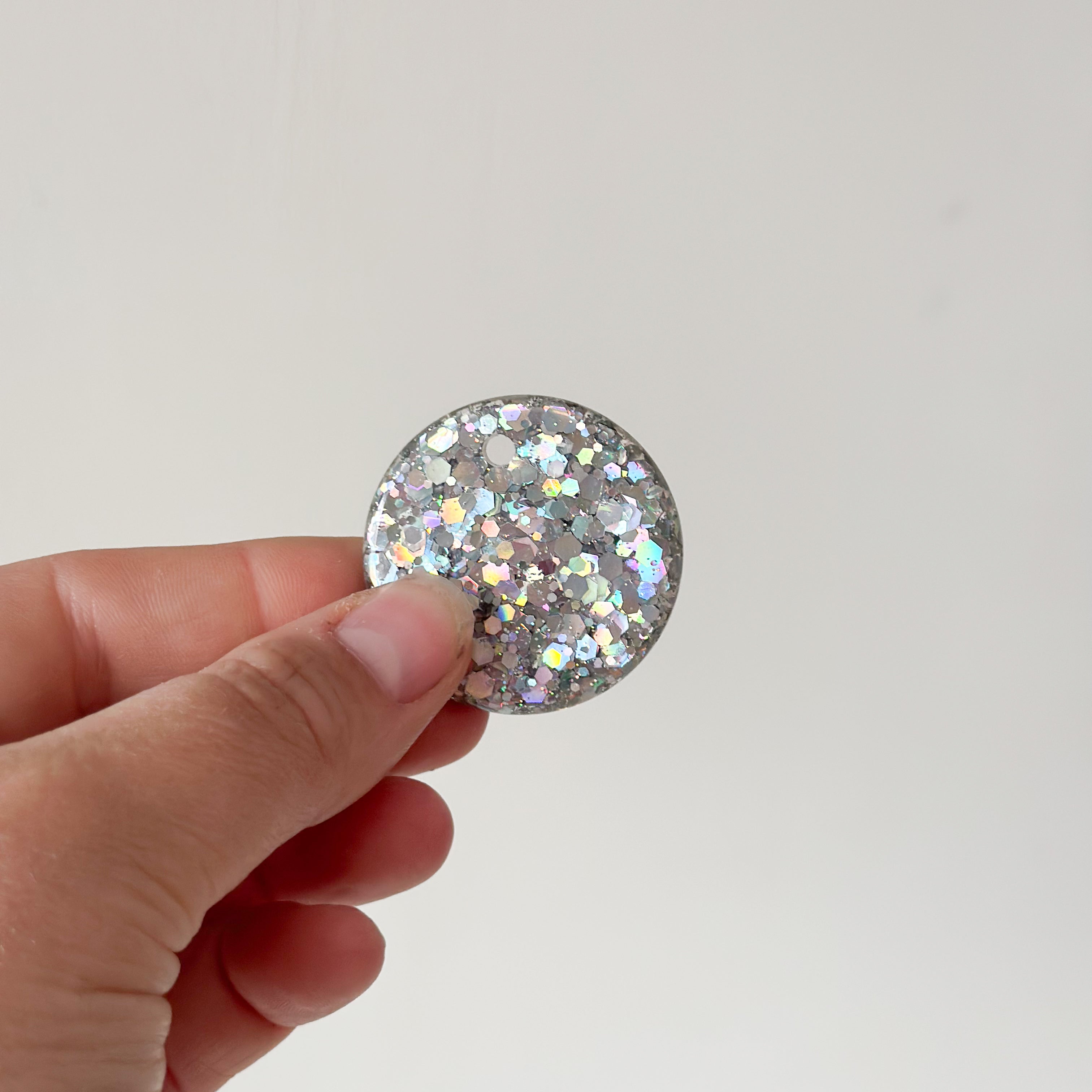 Tag rond zilveren glitter