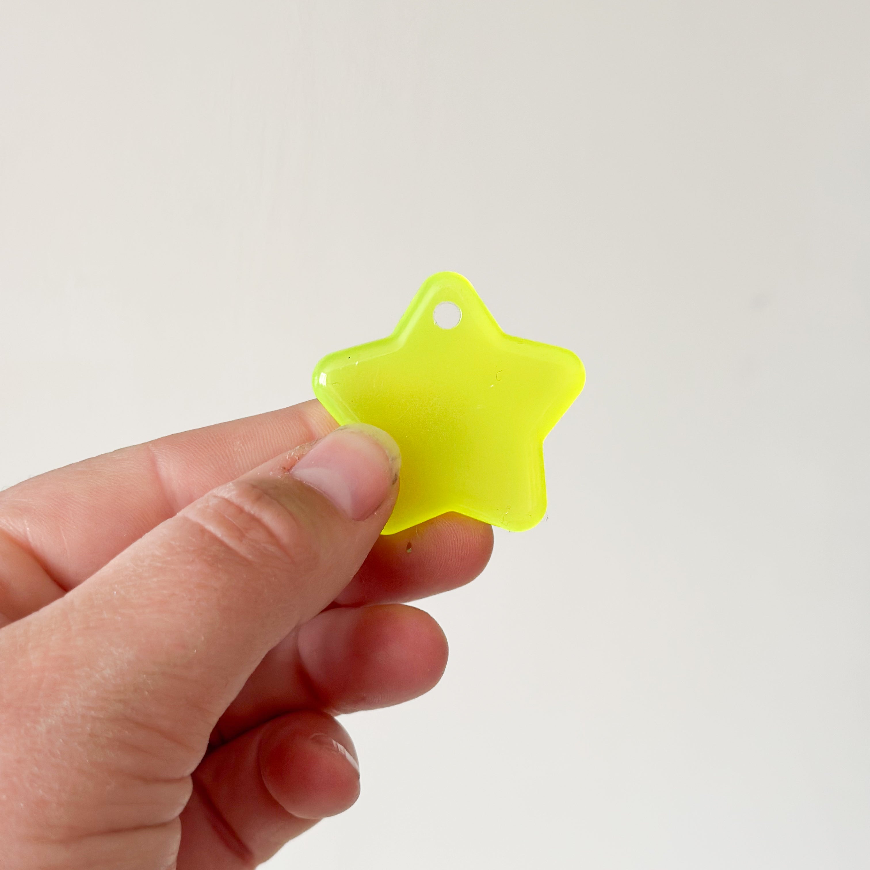 Tag ster glow in the dark geel