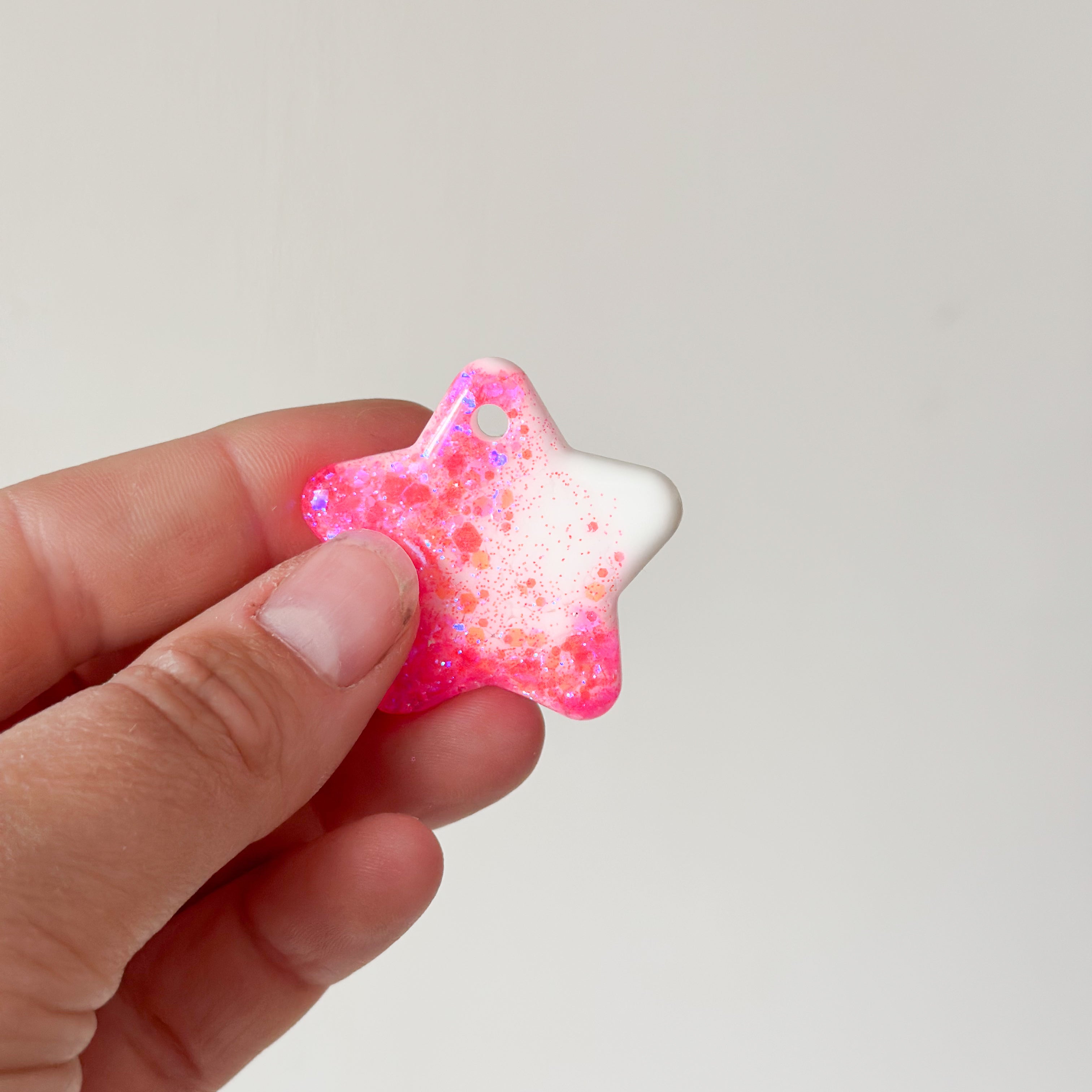 Tag ster wit en roze