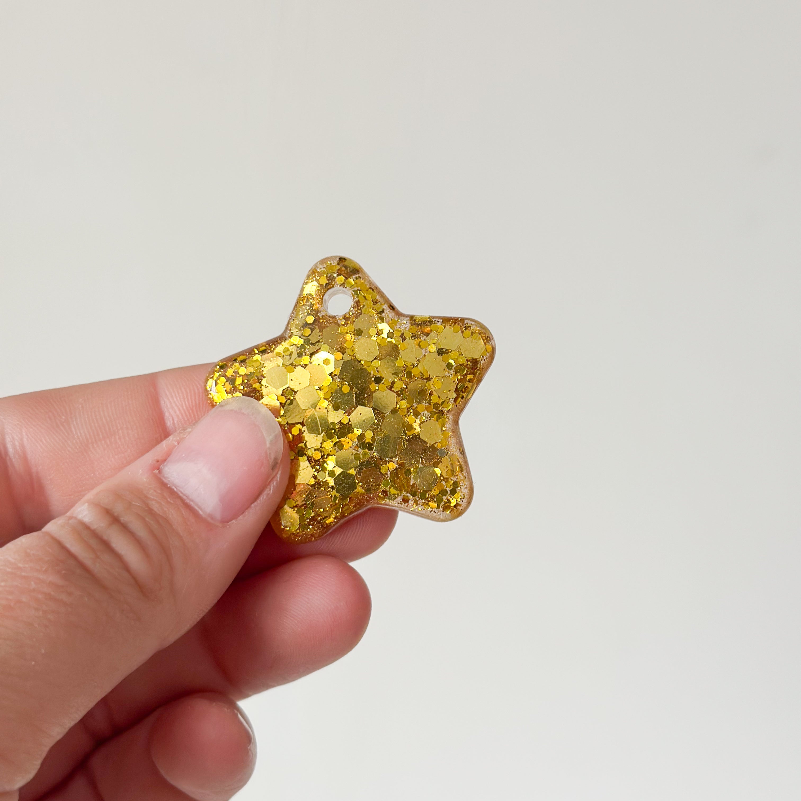 Tag ster goude glitter