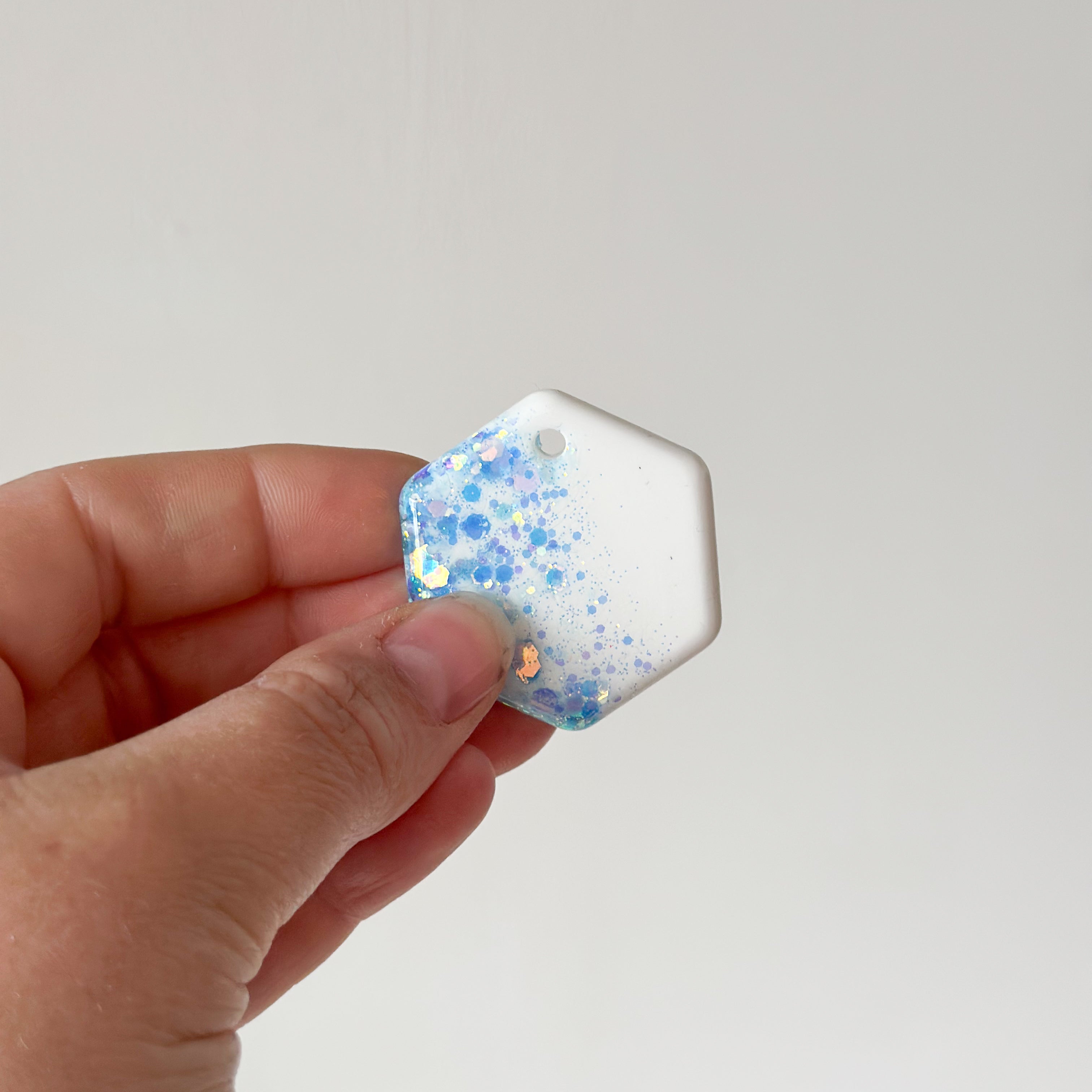 Tag zeshoek wit blauw