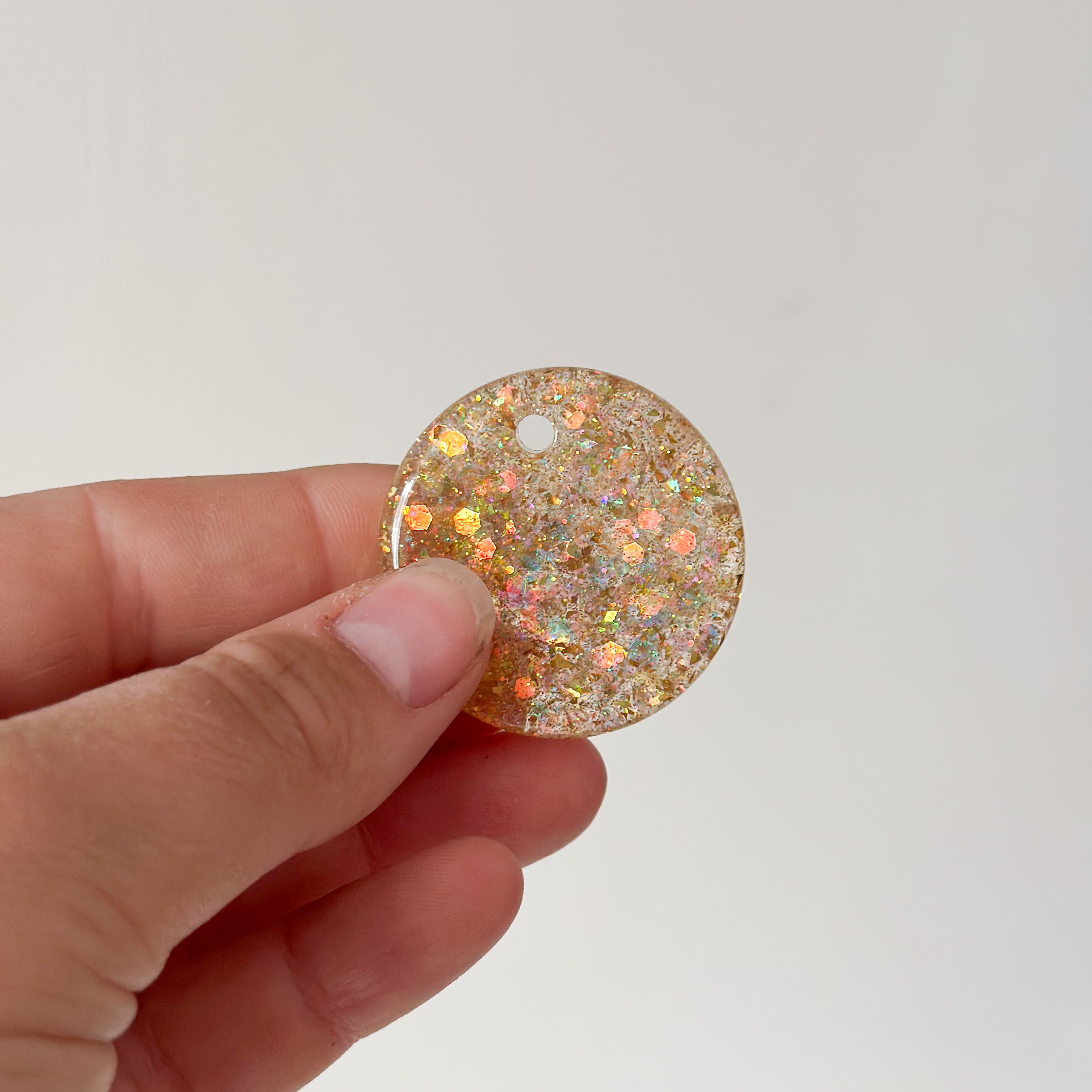 Tag rond goude glitter