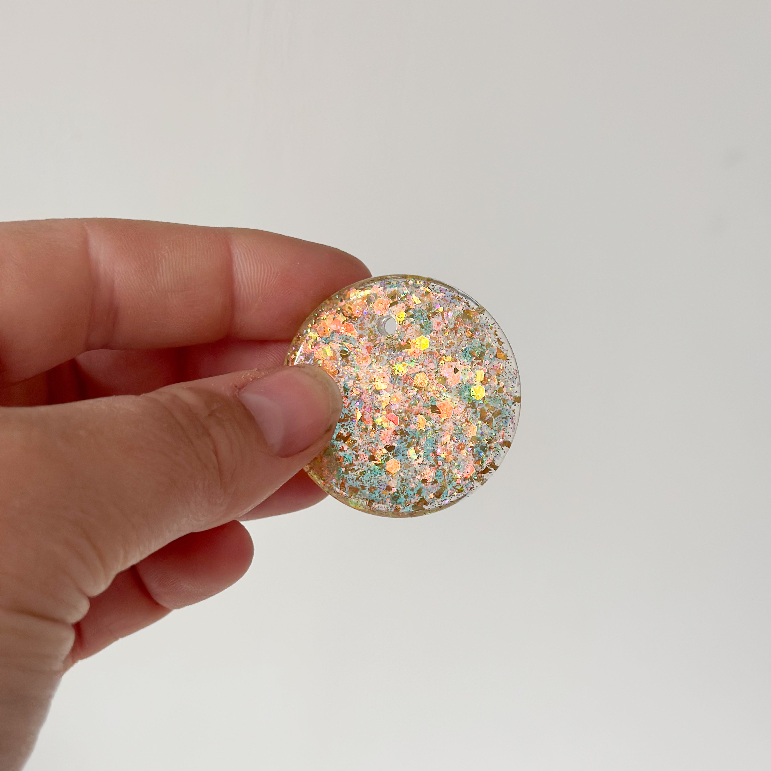 Tag rond goude glitter