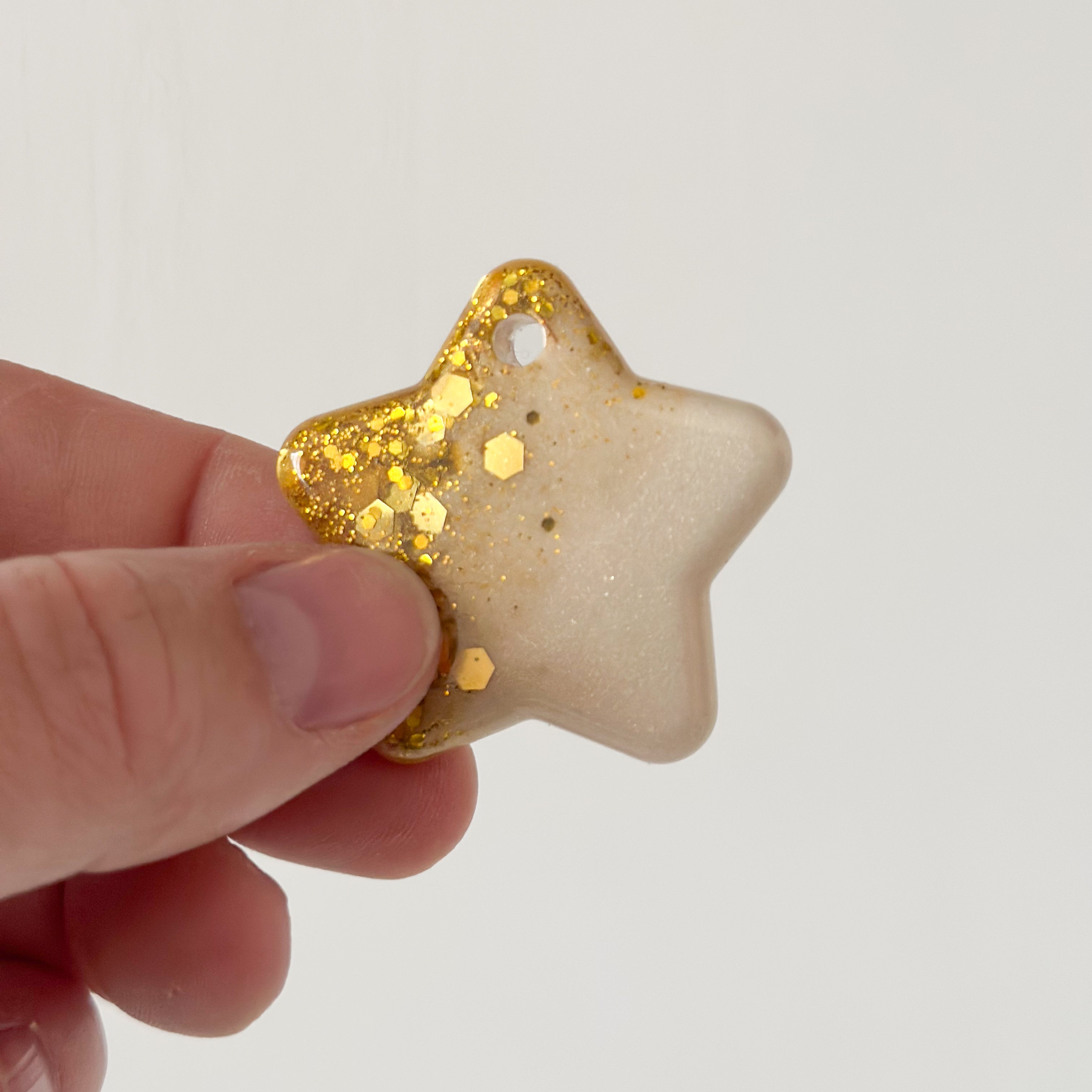 Tag ster goude glitter met parlemoer