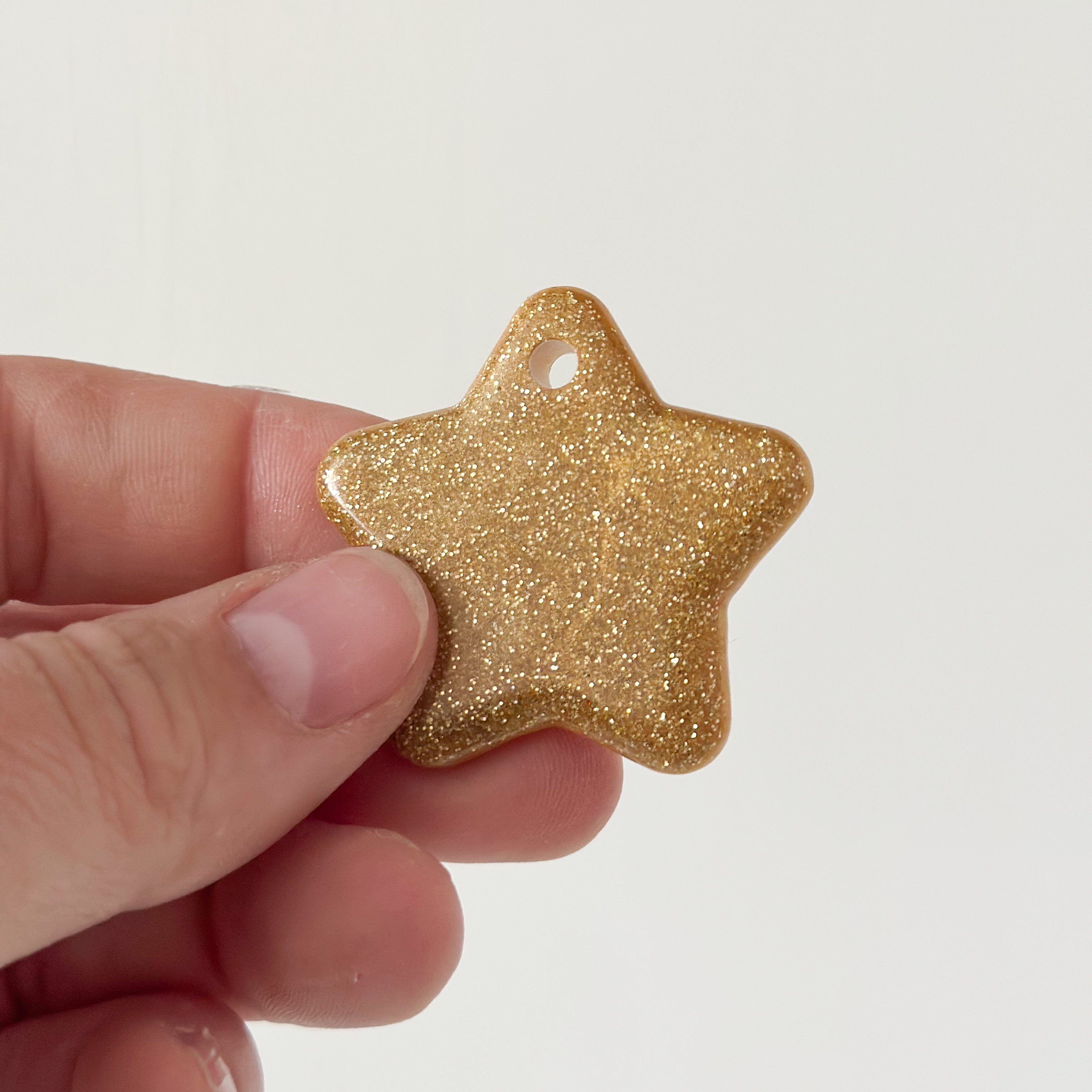Tag ster goude glitter
