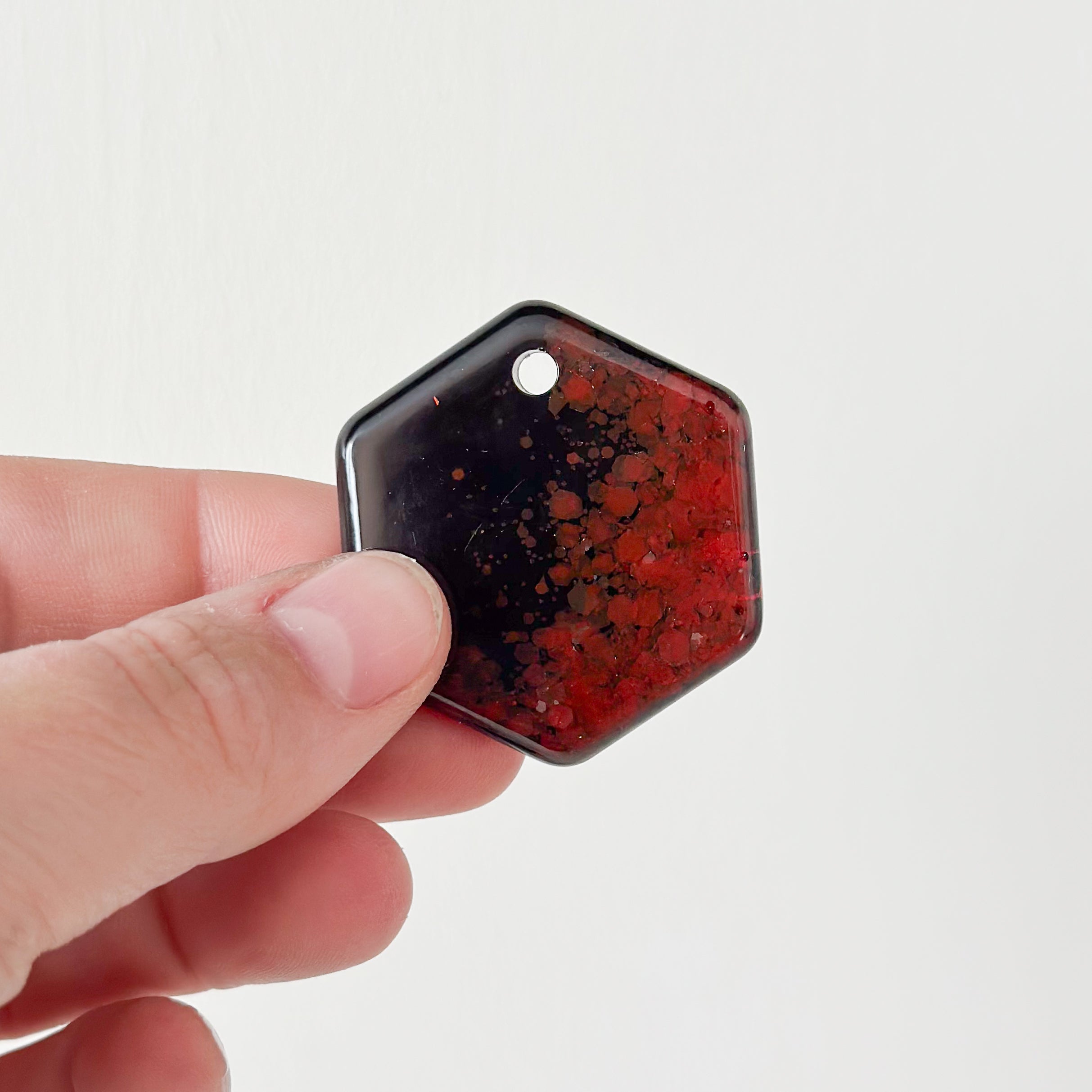 Tag zeshoek zwart en oranje