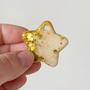 Tag ster goud met parlemoer glitter