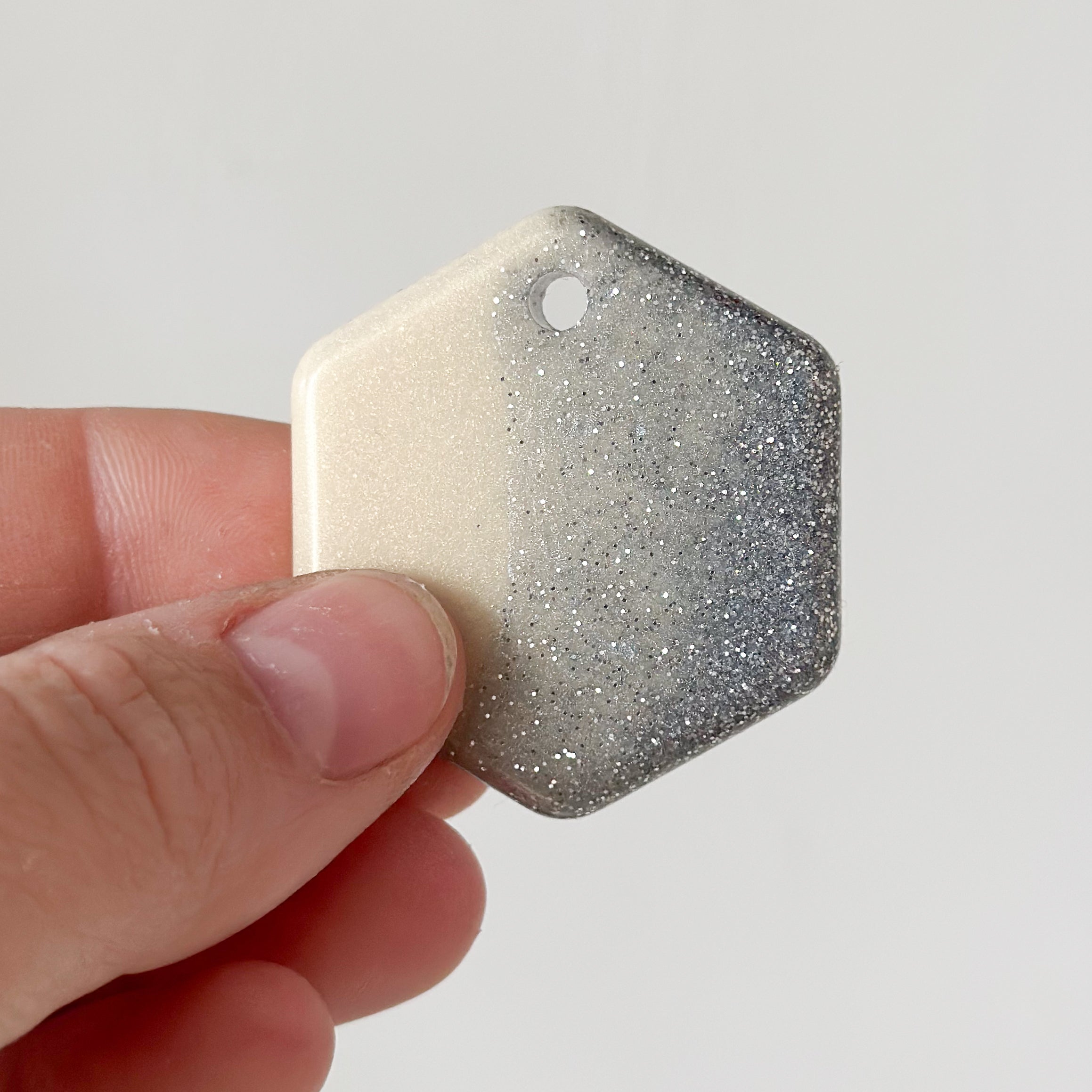 Tag zeshoek parlemoer en zilver glitter