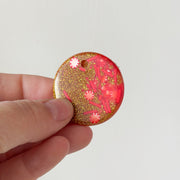 Tag rond snoepjes met goude glitter