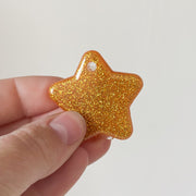 Tag ster goude glitter
