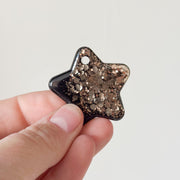 Tag ster zwart met goude glitter