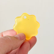 Tag bloem glow in the dark geel