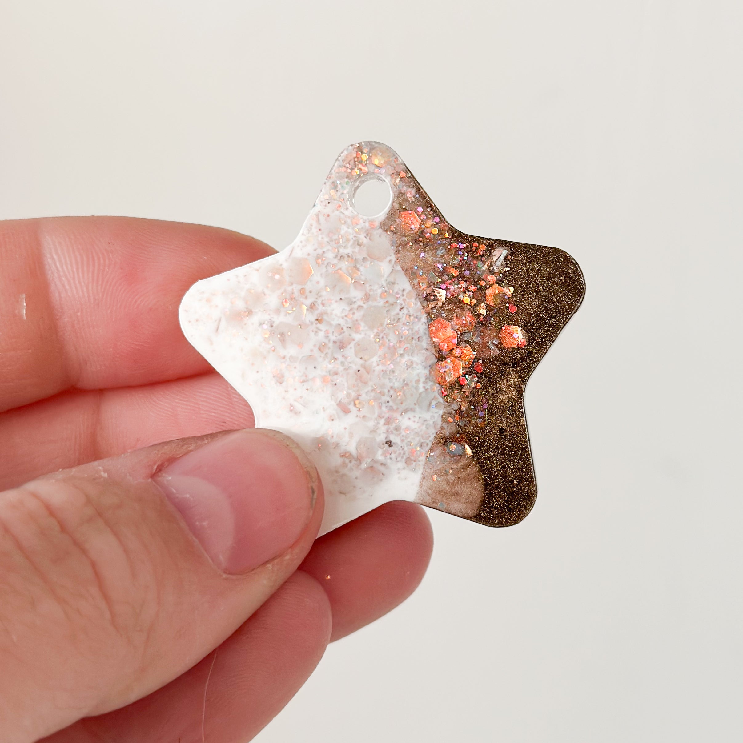 Tag ster bruin en wit